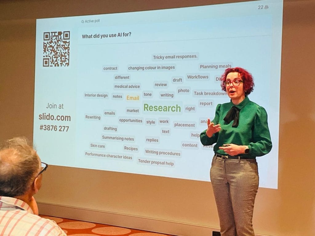 Nat in front of screen showing AI uses